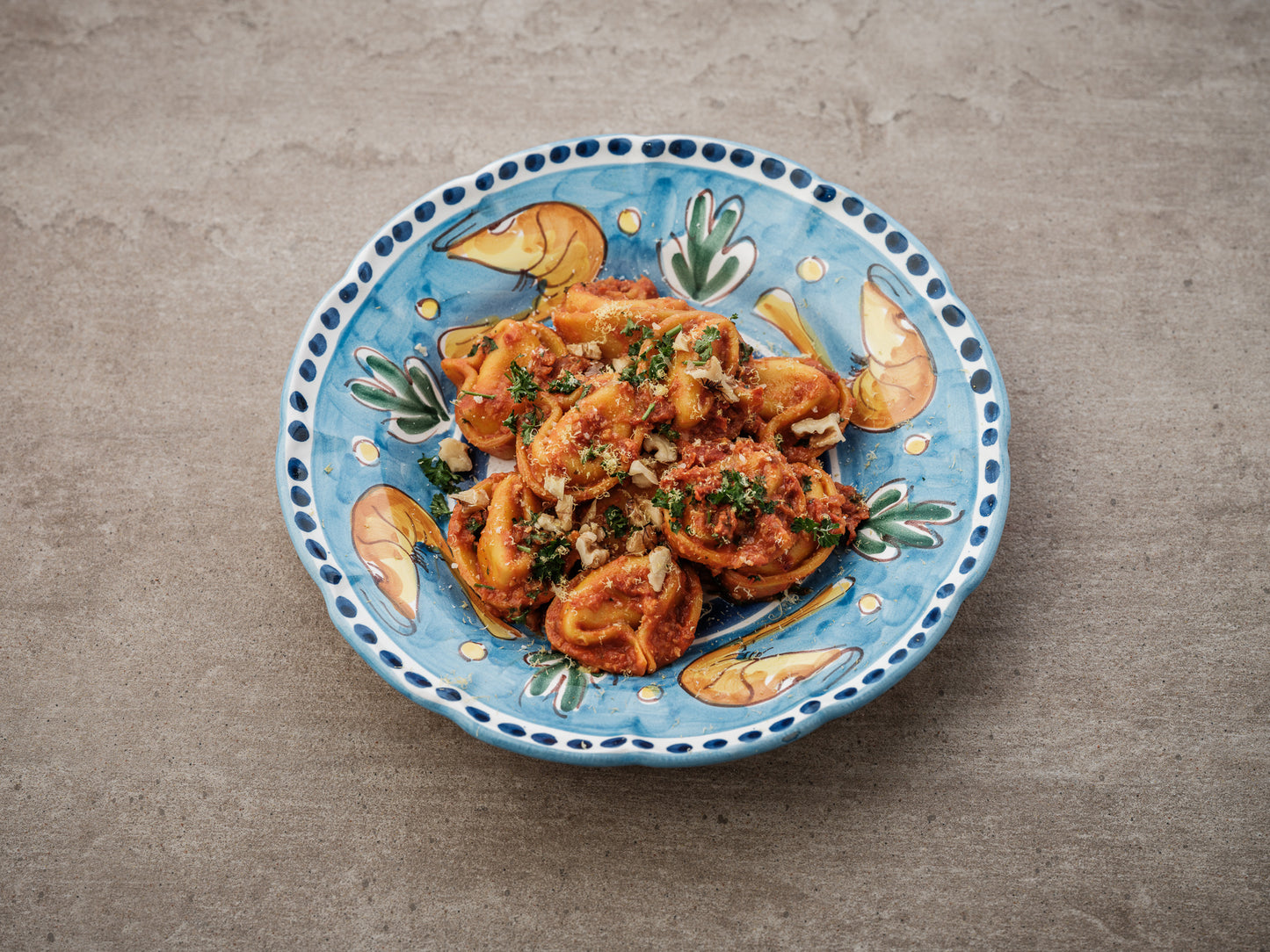 Tortellacci Aubergine/Mint with Muhammara Sugo