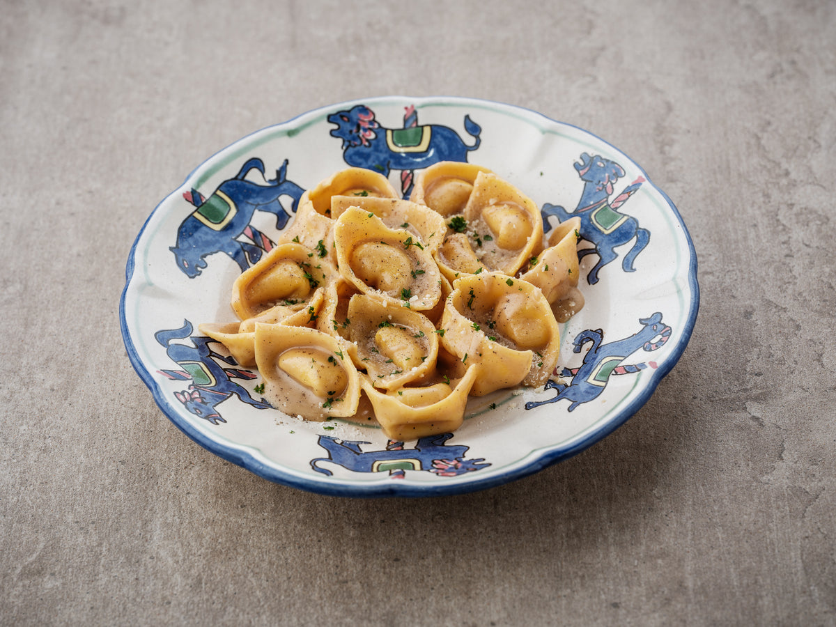 Mushrooms Cappelli with Pepper Sauce