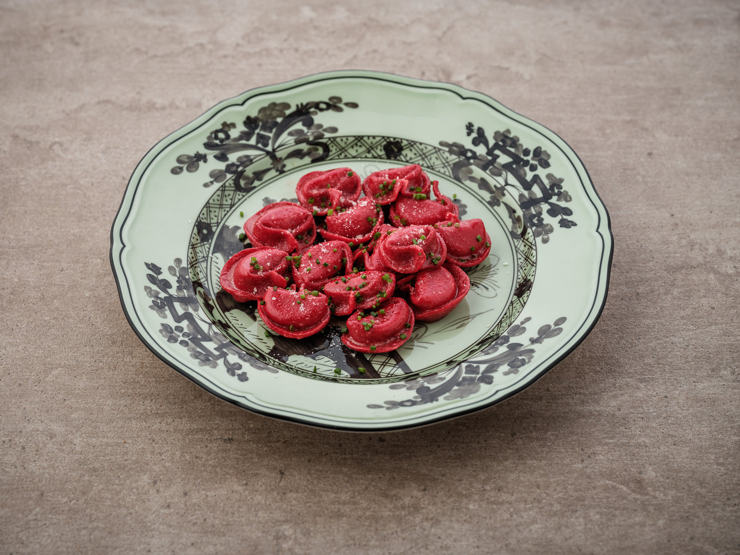 red tortellacci mozzarella/harissa/chive butter